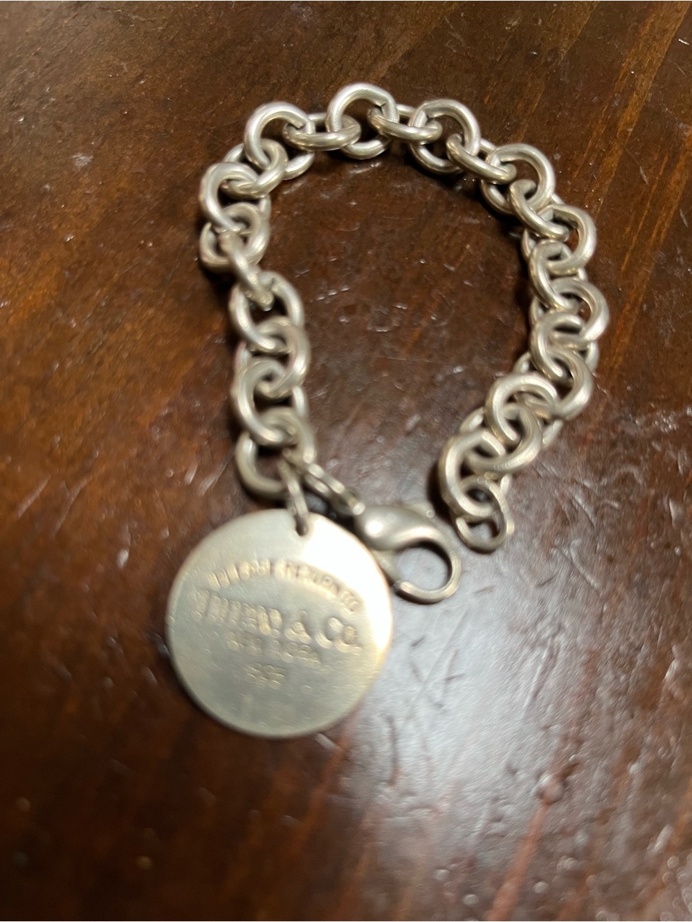 Tiffany & Co. Sterling Silver Round Tag Charm Bracelet